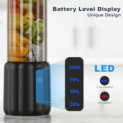 Portable blender with battery level display showing fruits inside.